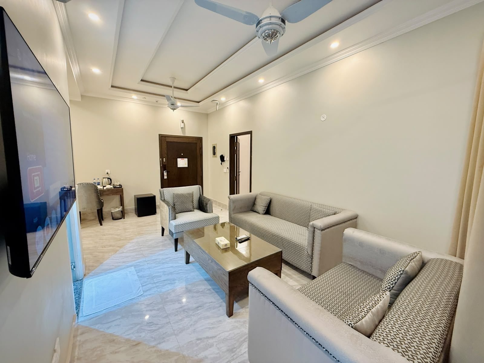 Executive Suite living room seating at Regency Suites Hotel, 48 Baloch Road, Gulberg III, Lahore