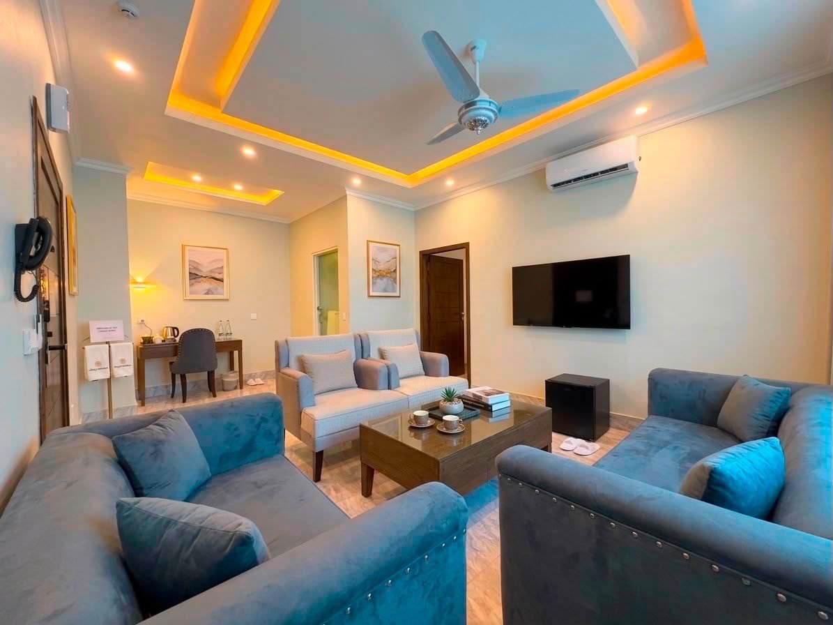 Executive Suite living room with sofas at Regency Suites Hotel, 48 Baloch Road, Gulberg III, Lahore