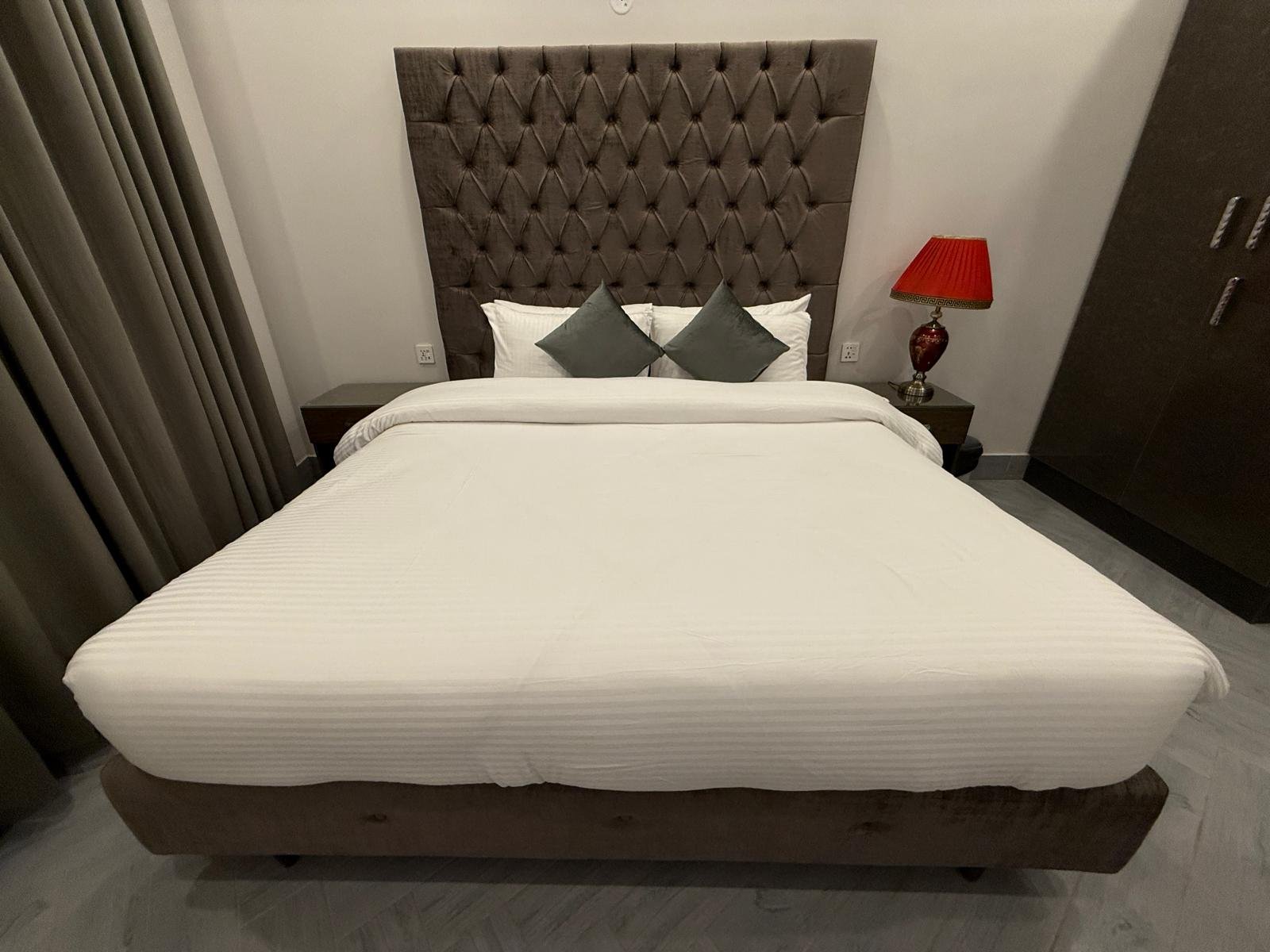 Quiet suite bedroom at Regency Suites hotel, 48 Baloch Road Lahore