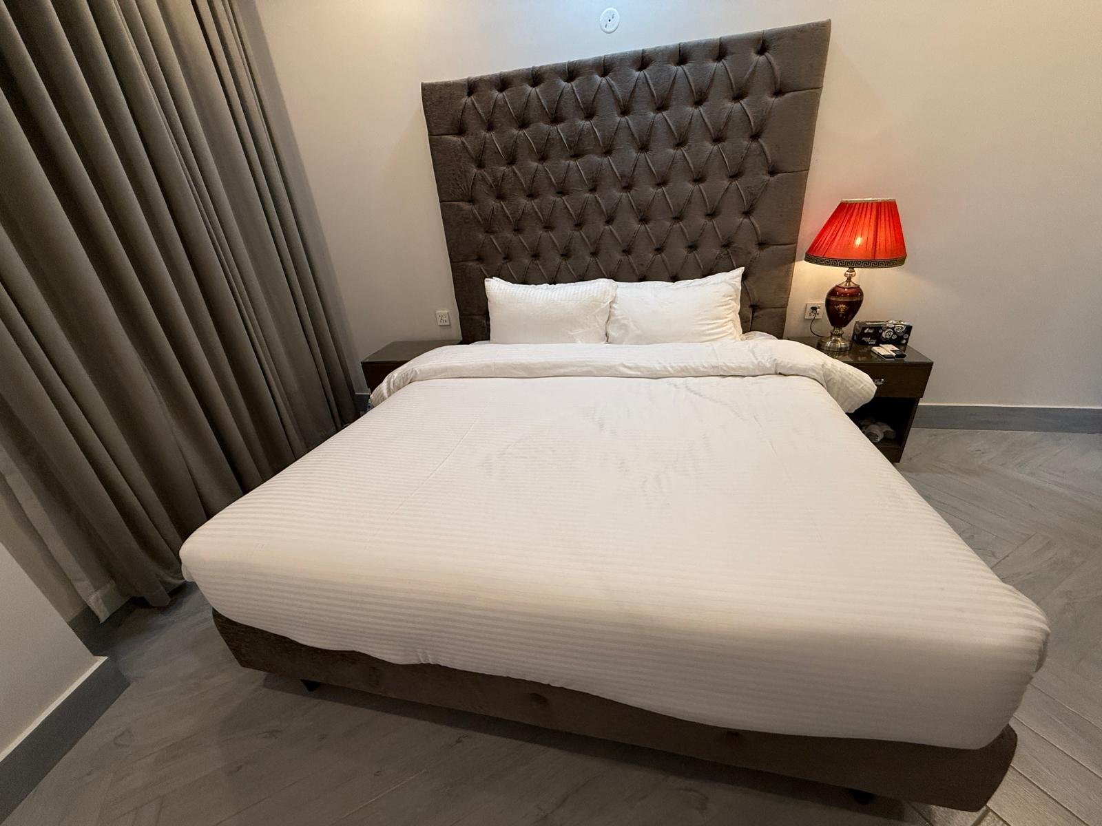 Clean suite with fresh linen at Regency Suites, Gulberg III